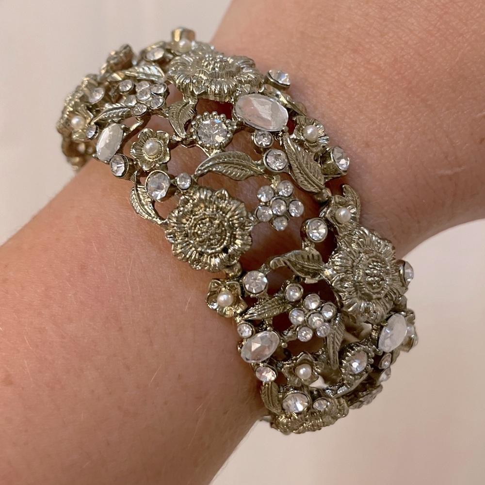 Gold jeweled stretch bracelet.